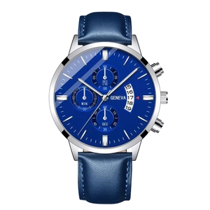 Detail of blue dial quartz watch with luminous calendar and silver stainless steel case