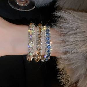Luxe geometric bracelet with crystals in rainbow, amber, and deep blue variants
