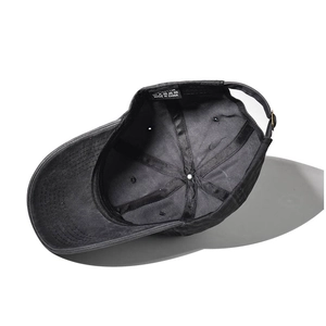 Internal view of washed cotton baseball cap with six-panel stitching and adjustable strap