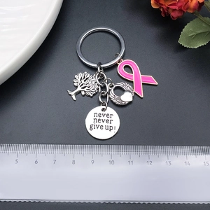 Never Give Up keychain with Tree of Life, angel wing heart and pink ribbon charm