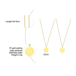 Detail view of gold stainless steel necklace with round Fu character and flower pendants