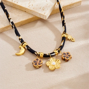 Retro leopard print necklace with gold crescent moon and camellia flower pendants