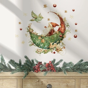 Detailed view of Santa on a moon wall sticker with festive berries and greenery