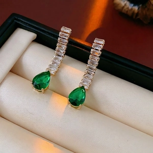Elegant emerald teardrop earrings with baguette-cut zircon in gold-plated settings