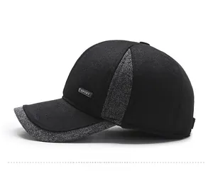 Side view of winter baseball cap for men featuring grey patchwork and SPORT label