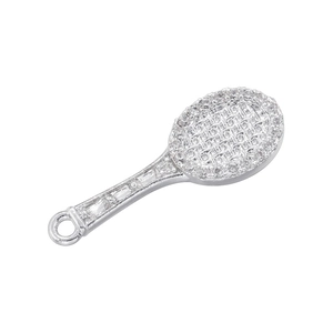 Detailed view of silver tennis racket pendant featuring sparkling rhinestones and bail