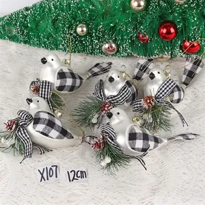 Detail of 5-piece silver bird ornaments with pine cones and check wings for Christmas trees