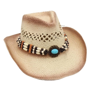 Detailed view of straw cowboy hat featuring ethnic beads and a turquoise gemstone accent