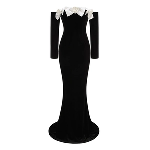 Elegant off-shoulder velvet mermaid gown with long sleeves and white rose decorations