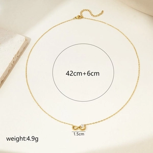 Elegant gold infinity necklace with heart-shaped zircon pendant and adjustable chain