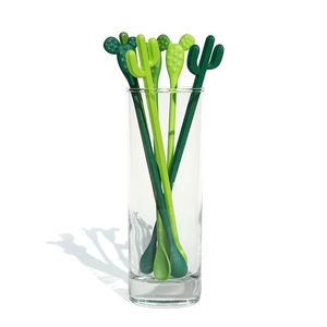 Green cactus-shaped drink stirrers in glass, creative long handle plastic swizzle sticks