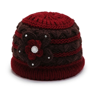 Warm burgundy knitted winter bucket hat for elderly women with floral accents
