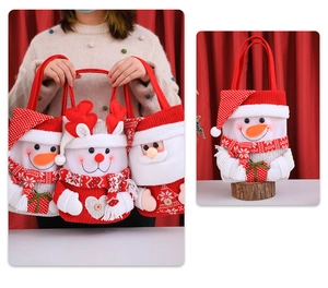 Christmas gift bags with snowman and reindeer designs in red and white knitted fabric