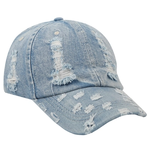 Close-up of light blue denim baseball cap featuring vintage distressed holes and frayed edges