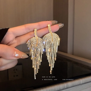 Sparkling leaf tassel drop earrings with crystals and gold finish for women