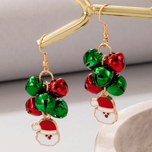 Detailed view of Christmas Santa Claus earrings with red and green bells on gold hook
