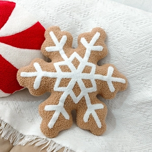 Macro detail of snowflake-shaped plush pillow with boucle texture for Christmas decor