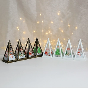 Row of triangular Christmas lanterns with snowman and Santa patterns and LED lighting