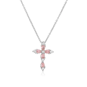 Macro detail of cross pendant featuring pink pear-cut crystals and white round zircons