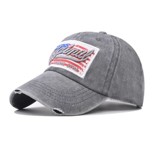 Detailed side view of distressed gray cotton baseball cap with American flag patch