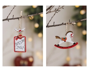 Detail of wooden reindeer and rocking horse ornaments hanging with jute rope strings