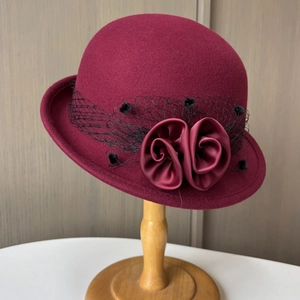 Elegant wine red wool felt cloche hat with vintage mesh veil and satin rose flowers