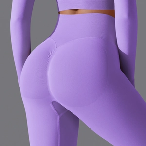 Detail of high waist seamless yoga pants with scrunch butt lifting design in light purple