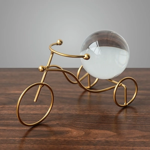 Minimalist golden tricycle metal sculpture with crystal ball for home decoration
