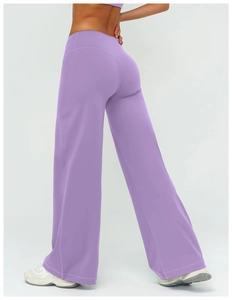 Rear view of high-waisted lavender wide-leg yoga pants showing V-shape back seam and drape
