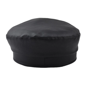 Close-up of high-quality black PU leather texture and fine stitching on the beret hat