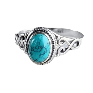 Vintage style S925 silver ring with oval turquoise and intricate hollow filigree details
