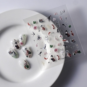 3D embossed nail art stickers with traditional crane, koi and geisha motifs on white tips