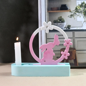 Oval silicone mold DIY candle holder base featuring a gradient rabbit and floral decoration