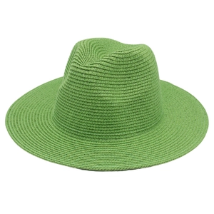 Detail of green straw Panama hat showing intricate weave texture and elegant fedora crown