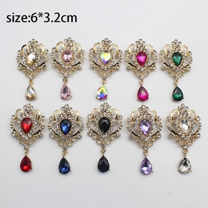 Vintage golden crystal brooches in 10 assorted colors featuring teardrop rhinestones
