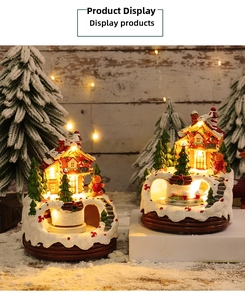 Detailreiches beleuchtetes Weihnachts-Spieluhrhaus mit LED-Licht und schneereichen Ornamenten