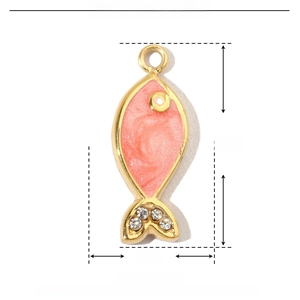 Macro detail of French fish enamel pendant showing 16mm size and rhinestone accents