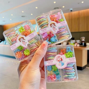 Colorful hair accessories set with elastic bands and small clips in transparent grid boxes