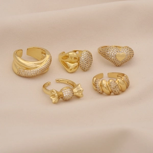 Five gold-plated geometric rings with pave zircon inlay and adjustable open design