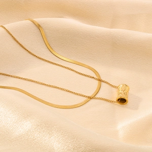 Elegant 18K gold-plated double-layer snake chain necklace with textured cylinder pendant