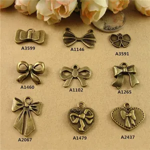 Zinc alloy bronze bow and heart pendants for jewelry making with reference coin