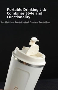 Detail of vacuum coffee mug lid with one-click opening and leak-proof steel rim