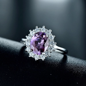 Elegant 925 silver ring featuring a large oval purple amethyst surrounded by white zircons