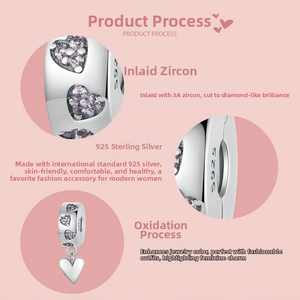 Detail of S925 sterling silver heart charm with pink cubic zirconia and S925 hallmark