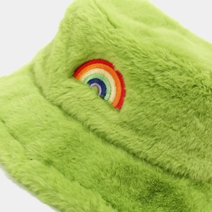 Faux fur bucket hat in neon green featuring a rainbow embroidery for winter warmth