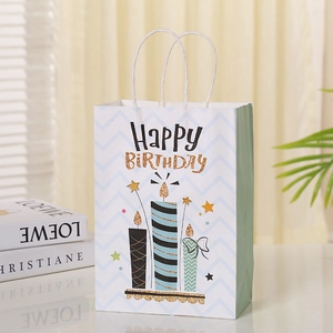 Detail of creative Happy Birthday paper gift bag with glitter candles and rope handle