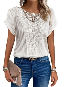 Detailed close-up of white crochet lace knit texture on a short-sleeve women's summer top