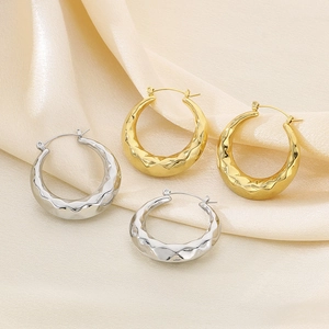 U-shaped hammered stainless steel hoop earrings in 18K gold and silver finishes