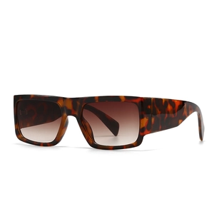 Modern square tortoiseshell sunglasses with brown gradient lenses on white background