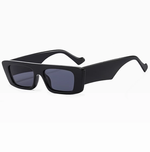 Detail view of bold black square frame sunglasses with wide temples and dark grey lenses